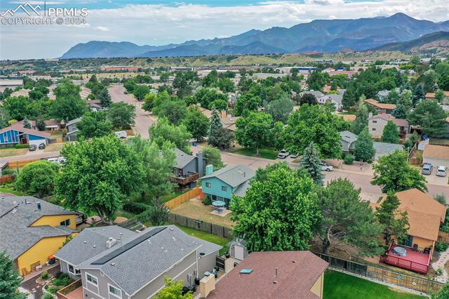 5255 Pinon Valley Road Colorado Springs, CO 80919 - Photo 47 of 47 Aerial view with a mountain view