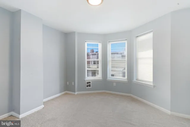 an empty room with a window