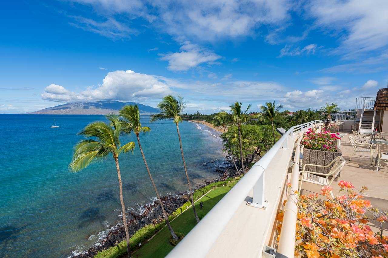 2430 South Kihei Road, Unit 206 Kihei, HI 96753 - Photo 22 of 26 a view of a swimming pool with a patio