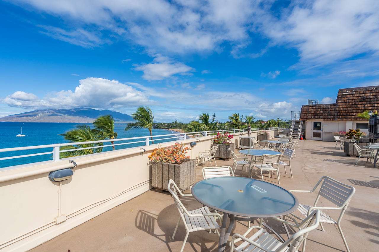 2430 South Kihei Road, Unit 206 Kihei, HI 96753 - Photo 25 of 26 a view of a patio with swimming pool