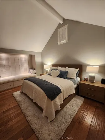 a spacious bathroom with a sink and mirror