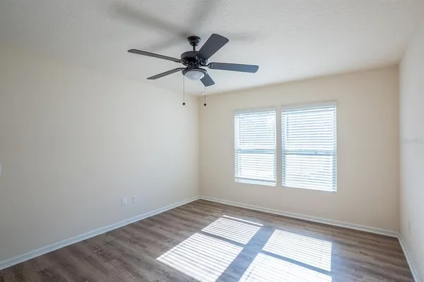 a view of an empty room and window