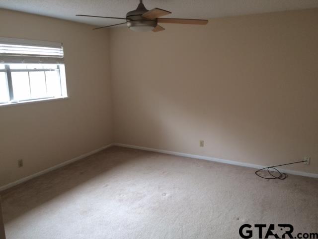201 Clemson Drive Tyler, TX 75703 - Photo 8 of 9 an empty room with a window