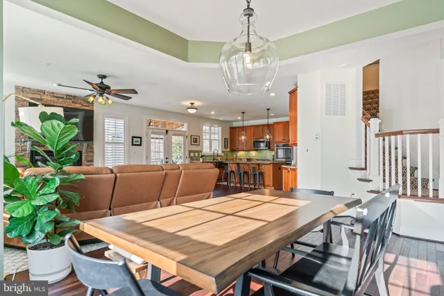 a bed room with a bed and a chandelier