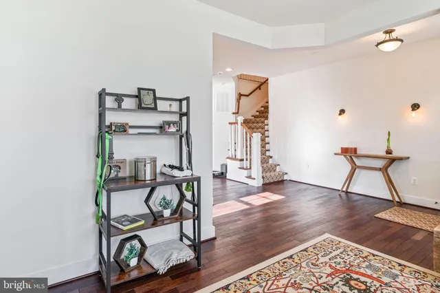 a bathroom with a sink a mirror and a shower