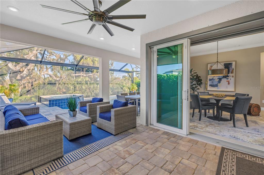 10735 Spring Tide Way Palmetto, FL 34221 - Photo 29 of 41 a living room with furniture and a large window