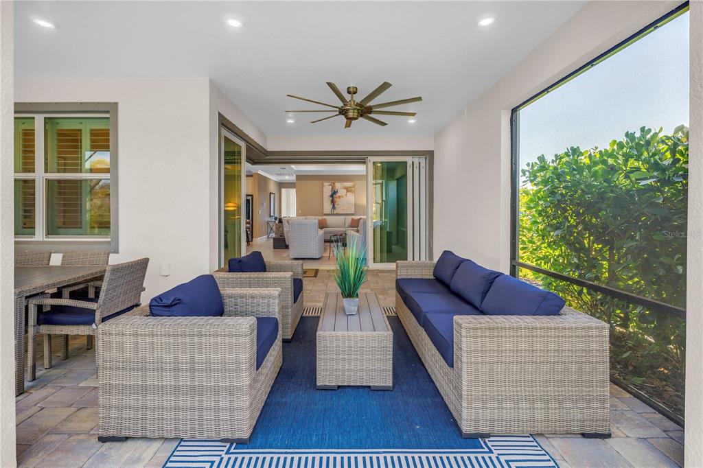 10735 Spring Tide Way Palmetto, FL 34221 - Photo 31 of 41 a living room with furniture and a large window