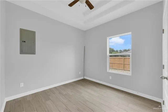 a bathroom with a sink vanity and mirror