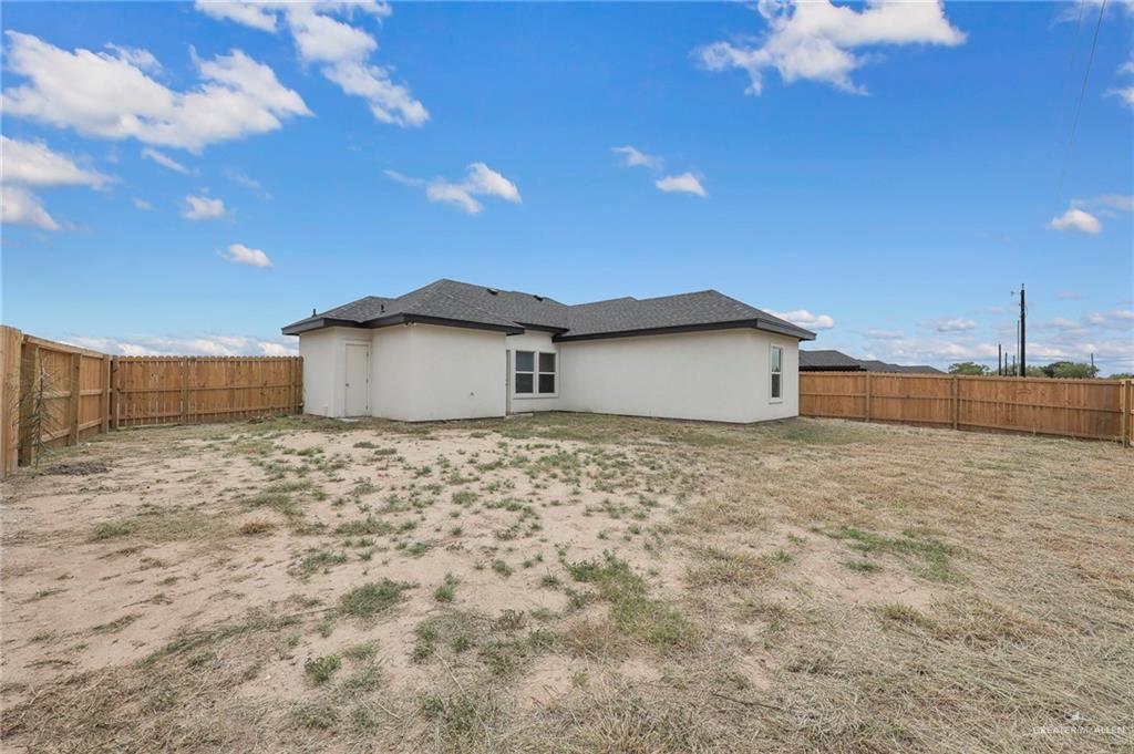 504 Bridget Street Weslaco, TX 78596 - Photo 19 of 23 a view of a house with a dry yard