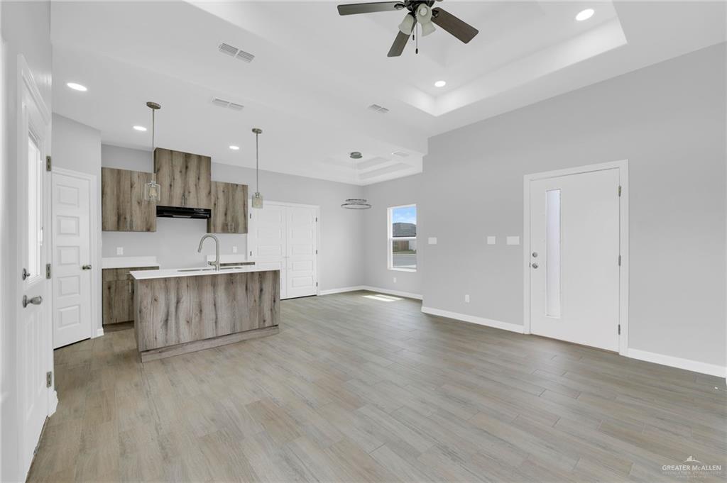 504 Bridget Street Weslaco, TX 78596 - Photo 5 of 23 a view of kitchen with sink and refrigerator