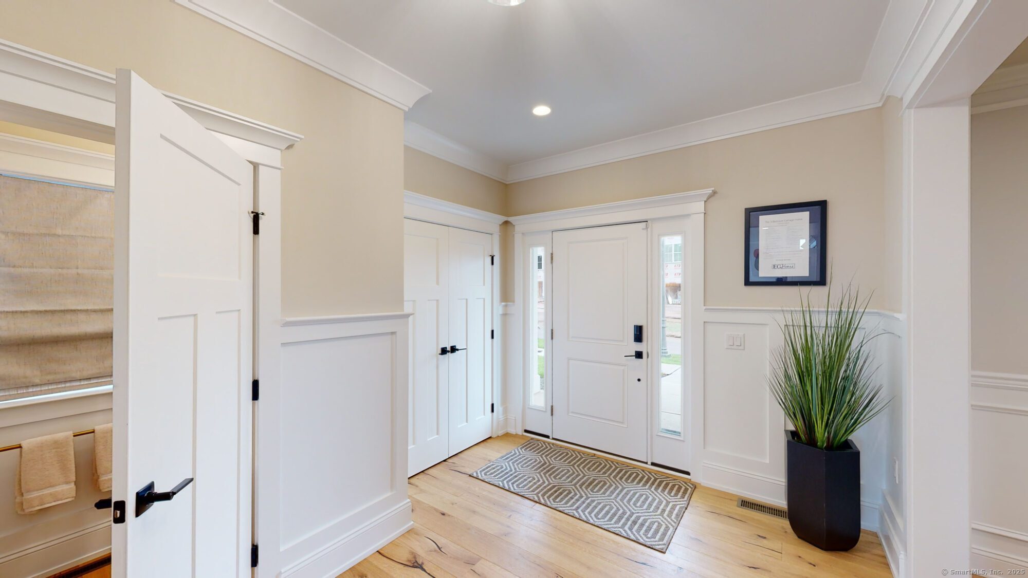86 Shea Circle, Unit 86 Cheshire, CT 06410 - Photo 2 of 13 a view of an entryway with wooden floor