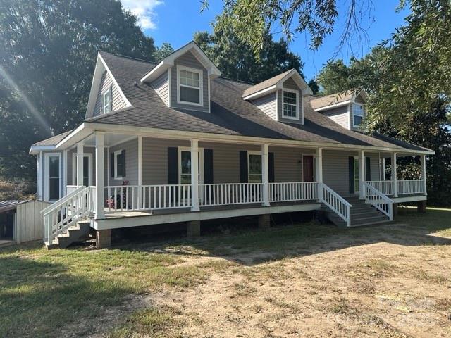610 Old Dutch Road West Indian Trail, NC 28079 - Photo 1 of 30 front view of a house with a yard