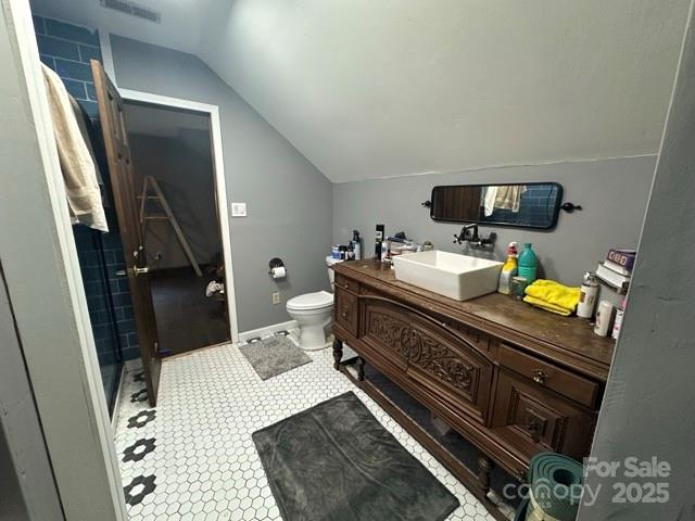 610 Old Dutch Road West Indian Trail, NC 28079 - Photo 17 of 30 a room with a washing machine and flat screen tv
