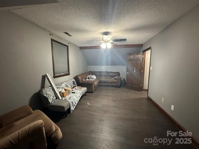610 Old Dutch Road West Indian Trail, NC 28079 - Photo 23 of 30 a living room with furniture and a chandelier