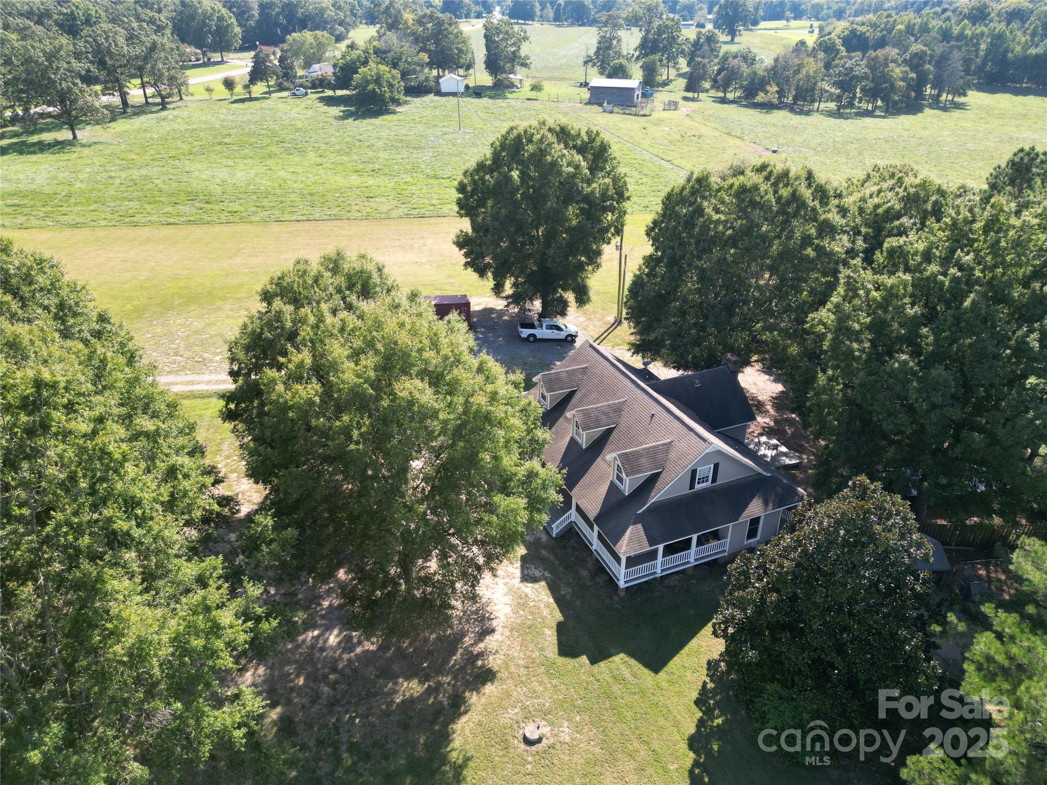 610 Old Dutch Road West Indian Trail, NC 28079 - Photo 25 of 30 an aerial view of a house with a lake view