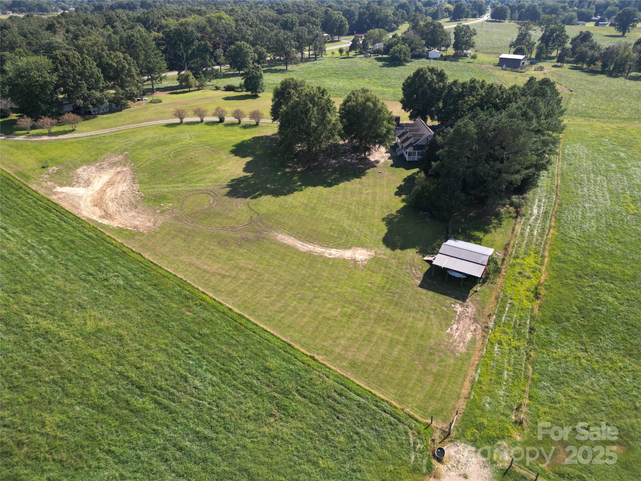 610 Old Dutch Road West Indian Trail, NC 28079 - Photo 29 of 30 a view of a lake with houses