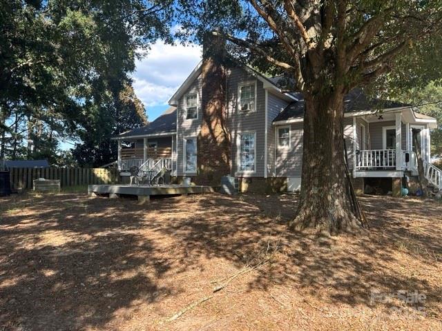 610 Old Dutch Road West Indian Trail, NC 28079 - Photo 30 of 30 a view of a house with a tree in a yard