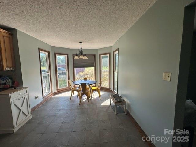610 Old Dutch Road West Indian Trail, NC 28079 - Photo 5 of 30 a view of a livingroom with furniture and a window