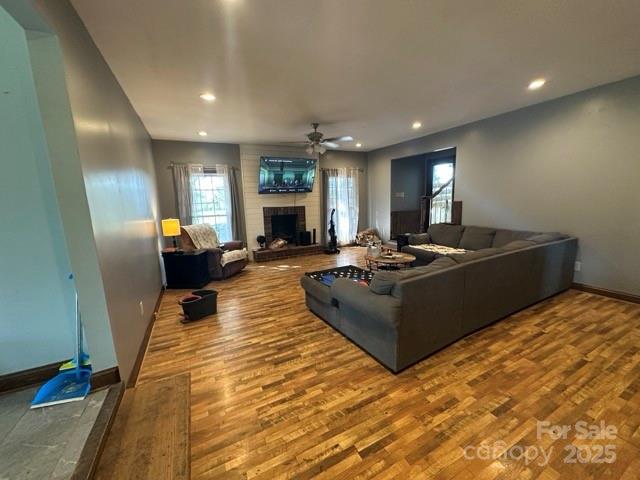 610 Old Dutch Road West Indian Trail, NC 28079 - Photo 6 of 30 a living room with furniture and a fireplace