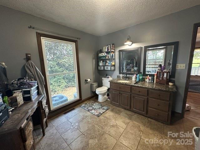 610 Old Dutch Road West Indian Trail, NC 28079 - Photo 9 of 30 a room with lots of wooden furniture and a large window