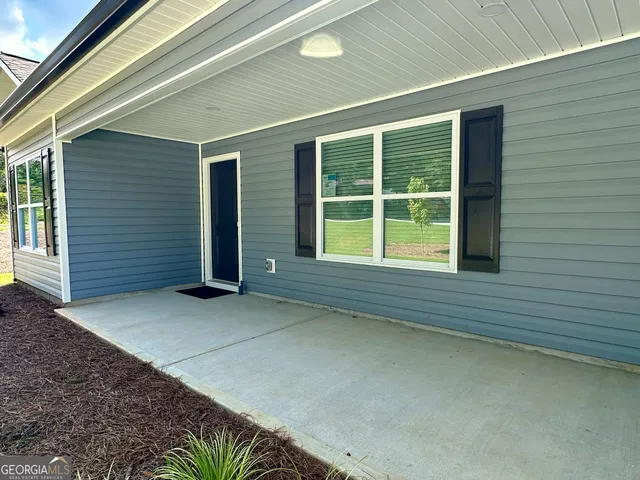 a view of a house with a large window