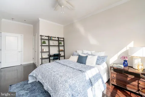a bedroom with a bed and a cabinets