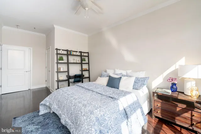 a bedroom with a bed and a cabinets