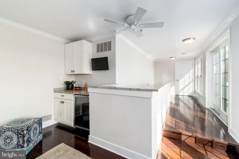 a kitchen with a sink and a microwave
