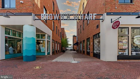 a view of swimming pool with a lake view