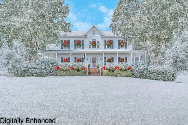 a view of a house with a big yard