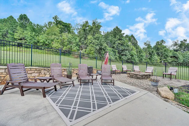 a table and chairs in front of house