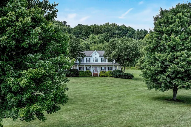 a view of a house with a big yard