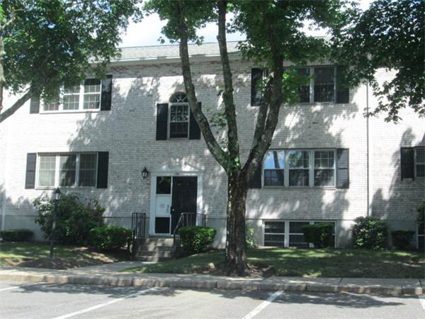199 Lake Shore Road, Unit 4 Boston, MA 02135 - Photo 2 of 13 a front view of a house