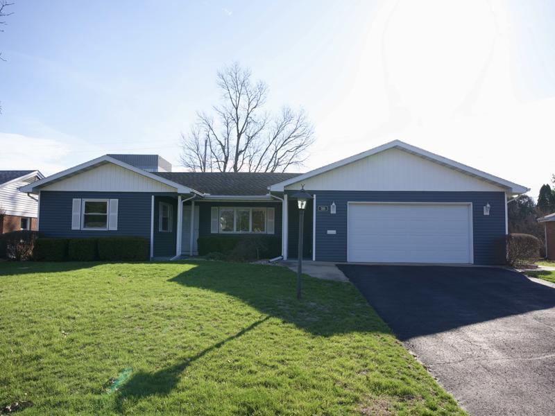 308 Granada Road Bloomington, IL 61701 - Photo 1 of 38 a front view of a house with yard and green space