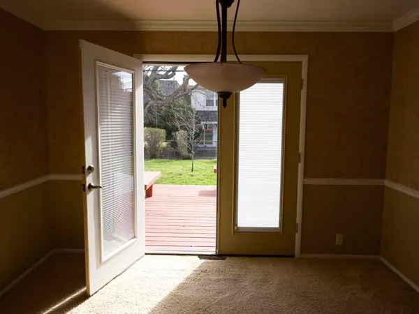 a view of a room with a large window