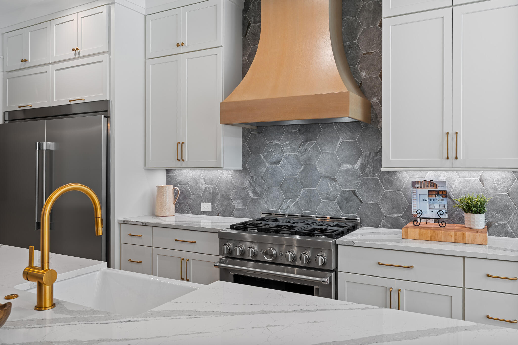 Lot 8 Shimmer Circle Freeport, FL 32439 - Photo 7 of 13 a kitchen with stainless steel appliances granite countertop a stove a sink and a microwave