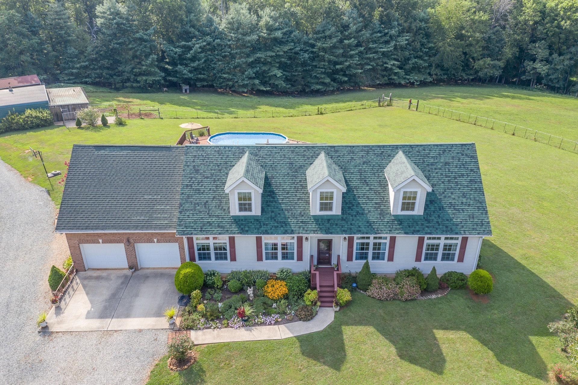 2494 Henry Road Ferrum, VA 24088 - Photo 5 of 60 a view of a house with a swimming pool