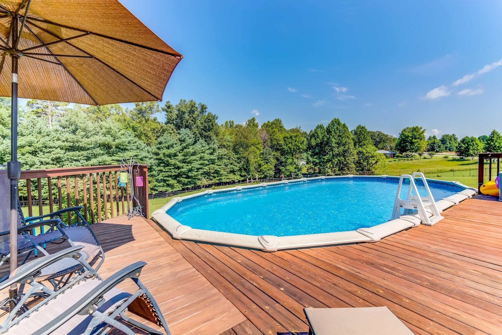 2494 Henry Road Ferrum, VA 24088 - Photo 41 of 60 a view of a swimming pool with a patio
