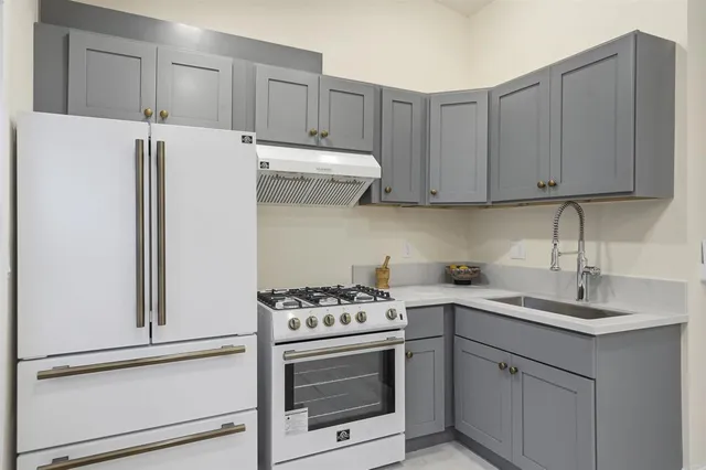 a view of a chairs and table in the patio