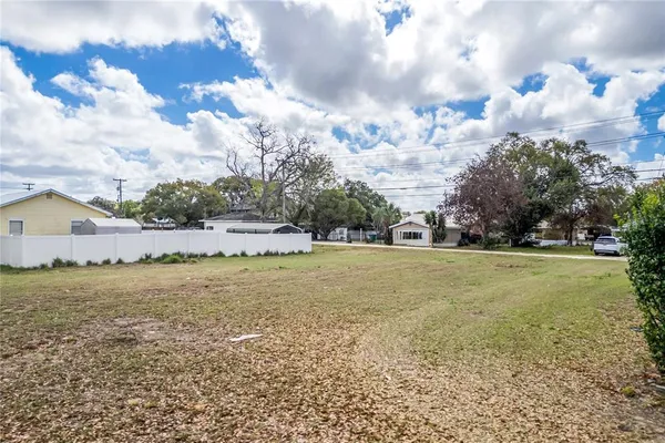 a house with swimming pool in front of it