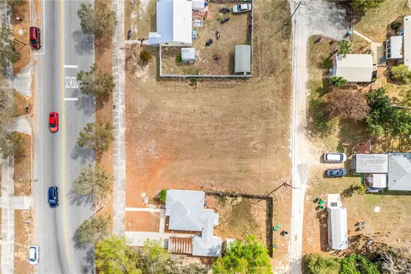 aerial view of residential houses with outdoor space