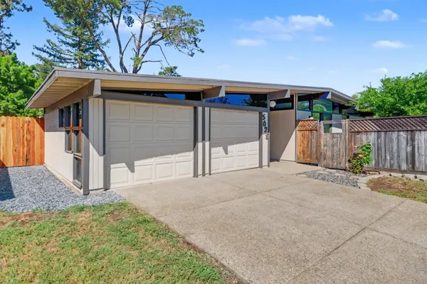 a view of a house with a garage
