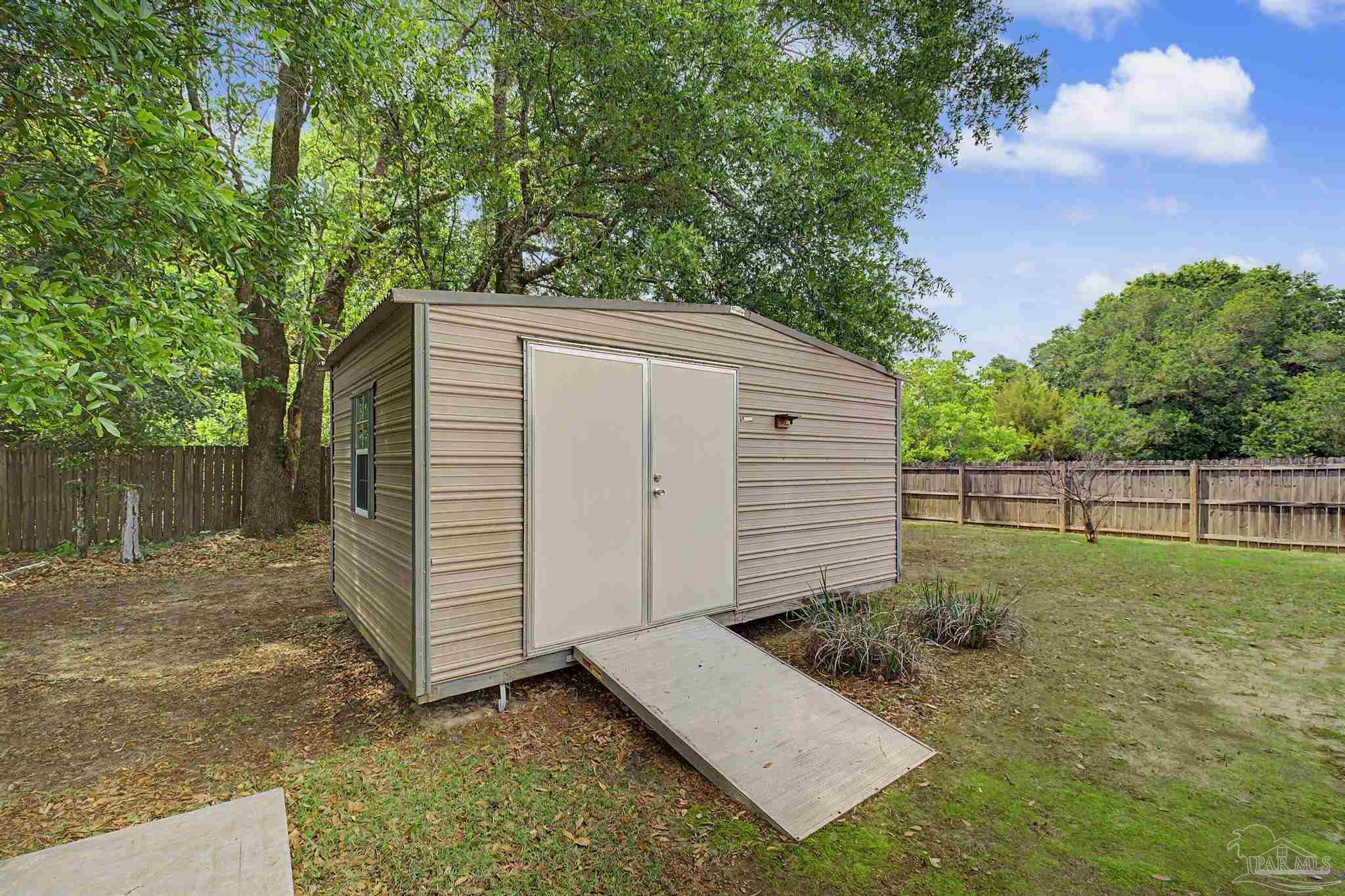 5461 Tucker Circle Pace, FL 32571 - Photo 36 of 52 a view of a backyard