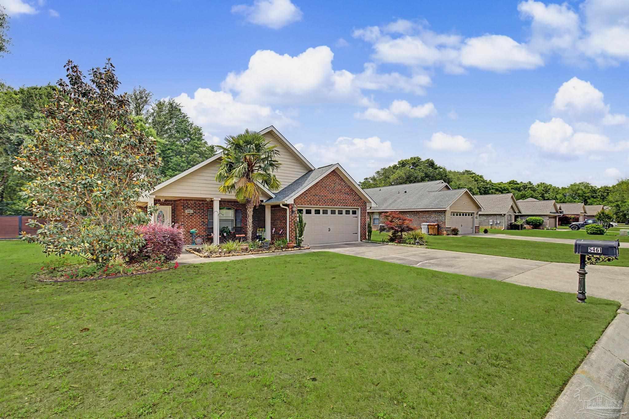 5461 Tucker Circle Pace, FL 32571 - Photo 46 of 52 a view of a house with a big yard