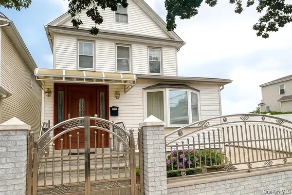 a front view of a house with a balcony