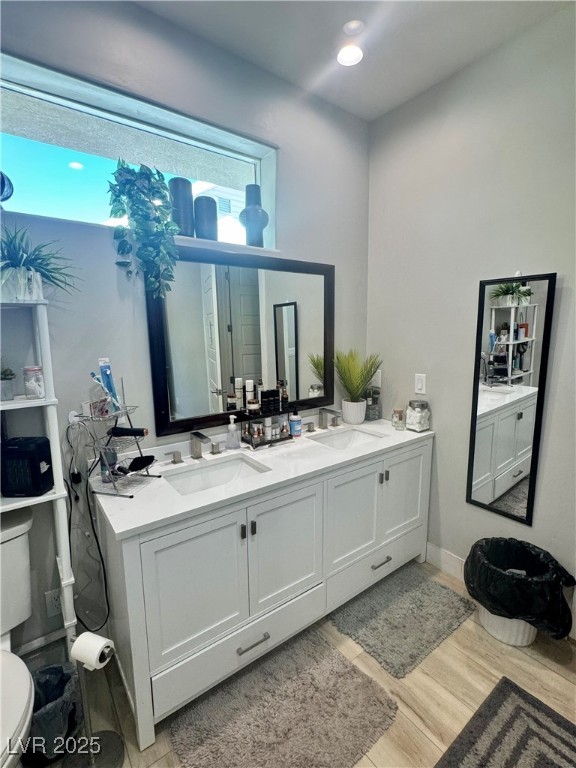 251 Spring Heights Caliente, NV 89008 - Photo 13 of 19 Bathroom featuring light wood-type flooring, double vanity, and recessed lighting