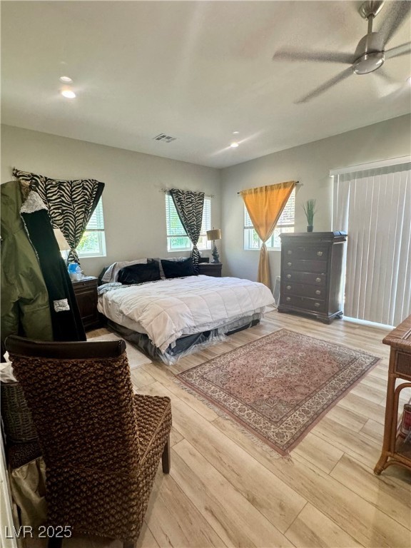 251 Spring Heights Caliente, NV 89008 - Photo 9 of 19 Bedroom featuring light wood-style floors, ceiling fan, and recessed lighting