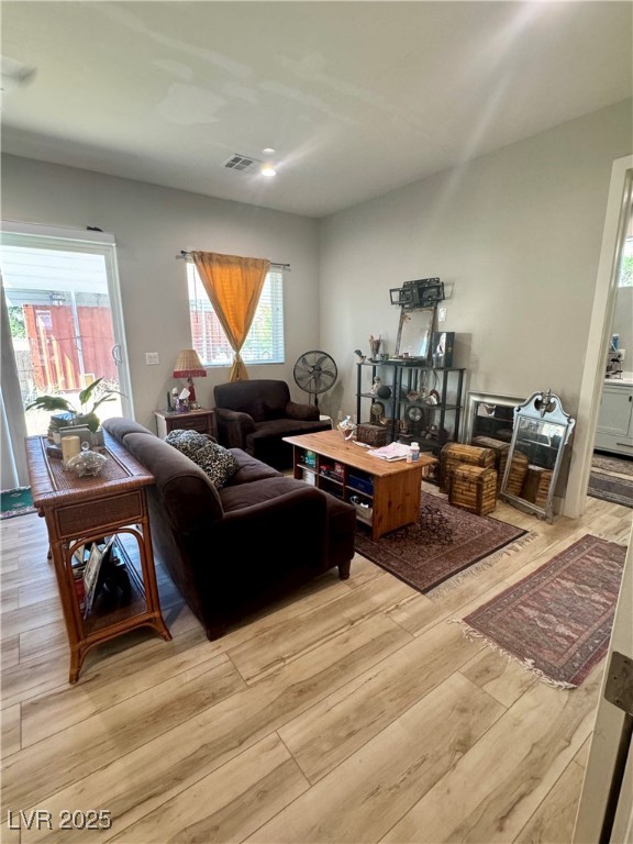 251 Spring Heights Caliente, NV 89008 - Photo 10 of 19 Living area with light wood-type flooring and plenty of natural light
