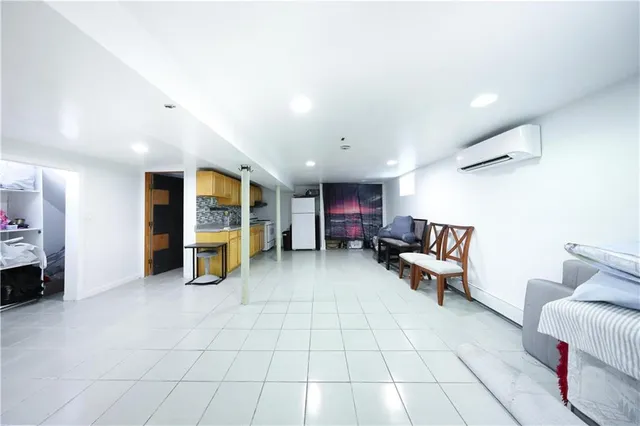 a view of a livingroom with furniture and a couch