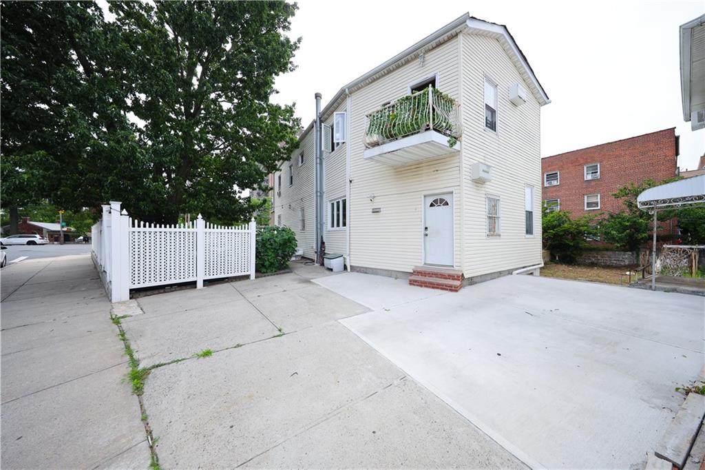 2667 Cropsey Avenue Brooklyn, NY 11214 - Photo 6 of 40 front view of a house with a yard